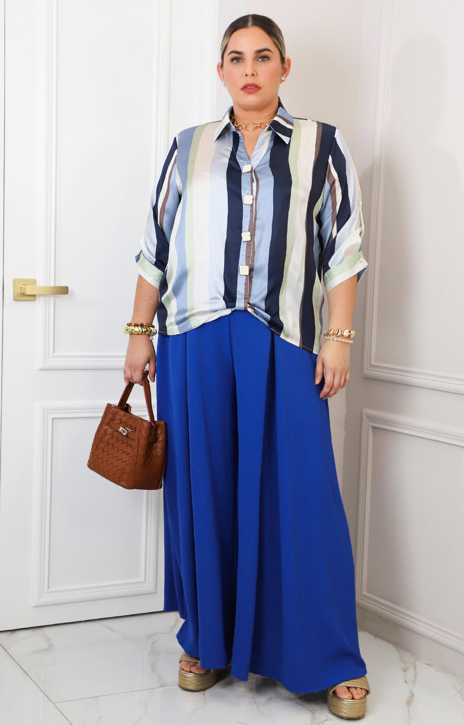 Blusa satinada a rayas azul