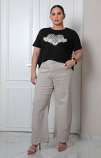 Blusa con estampado animal print y pedrería