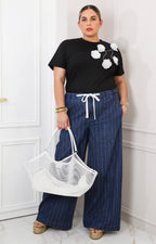Pantalón denim a rayas