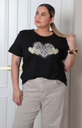 Blusa con estampado animal print y pedrería