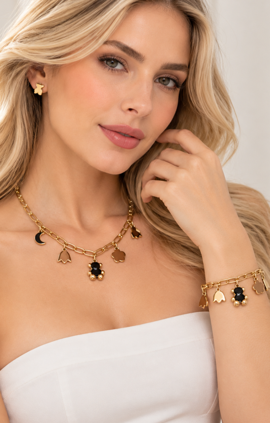 Set de collar, pulsera y aretes con dijes y osito