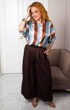 Blusa camisera a rayas con botones decorativos