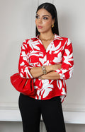 Blusa camisera roja con estampado tropical