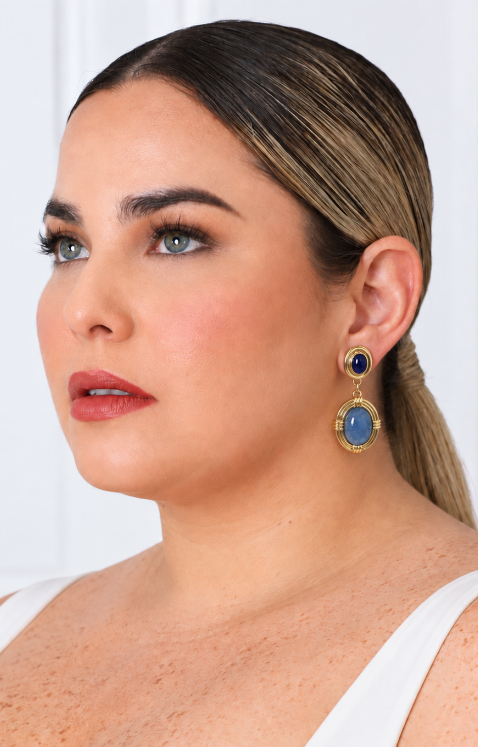 Aretes colgantes de dos piedras