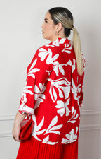 Blusa con estampado floral blanco y botones dorados