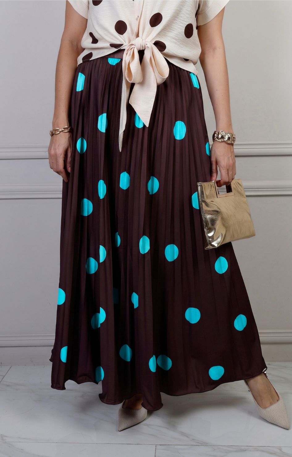 Falda plisada de polka dots