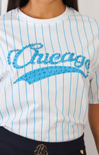 Blusa de rayas y aplicaciones de brillo