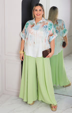 Blusa beige con estampado floral