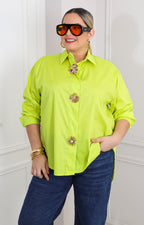 Blusa verde con botones dorados