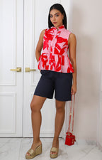 Blusa rosa estampada con botones