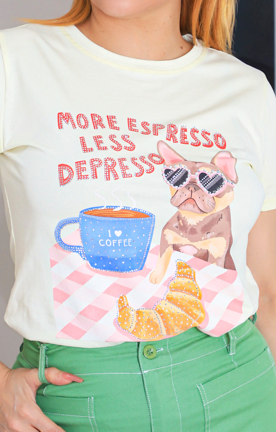 Blusa con estampado y aplicaciones de brillos