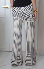 Pantalón beige con rayas y drapeado