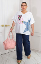 Blusa blanca con estrella denim