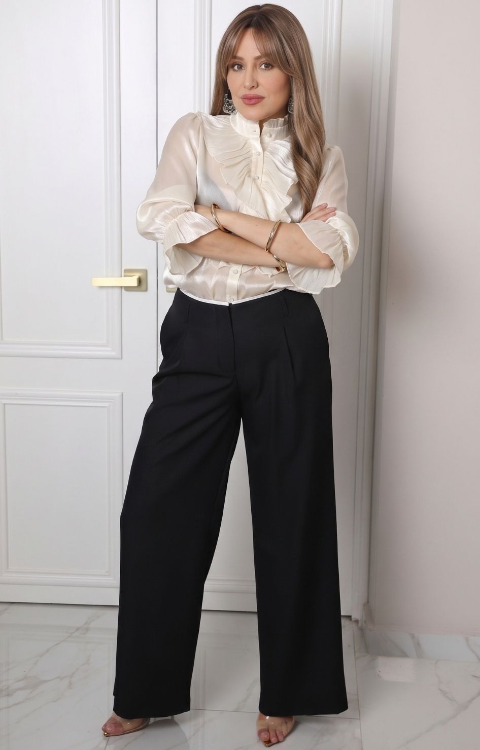 Blusa con olanes y mangas largas