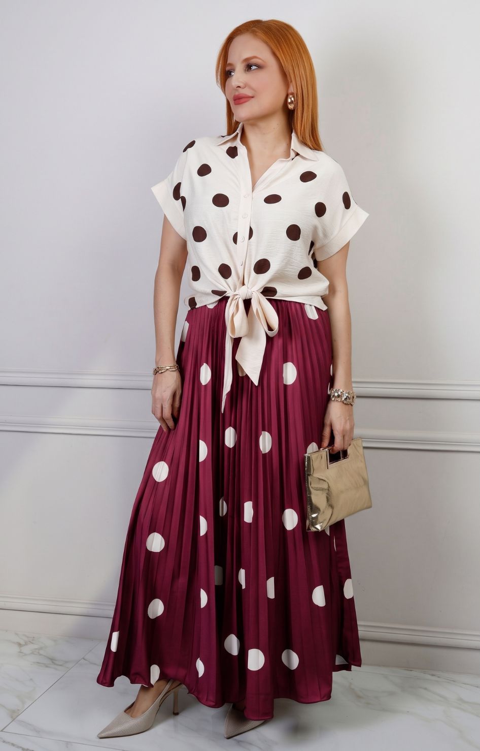 Falda plisada de polka dots