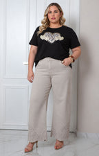 Pantalón beige con bordado floral