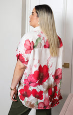 Blusa beige camisera con estampado floral