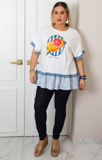 Blusa blanca con estampado de cítricos y olán