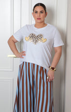 Blusa con estampado animal print y pedrería