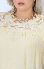 Blusa amarilla bordada