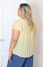 Blusa amarilla bordada