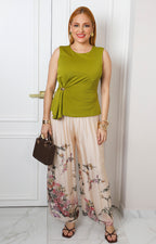 Pantalón beige con estampado floral