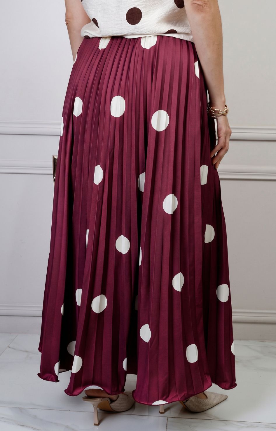 Falda plisada de polka dots