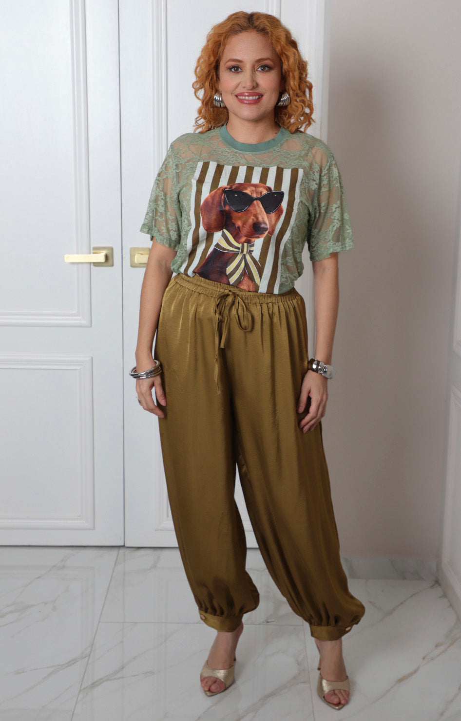 Blusa de encaje con estampado gráfico