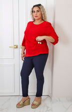 Blusa con broche lateral