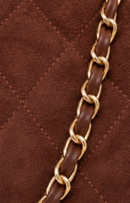 Bolsa hobo de Boutiquemirel con cadena, bolso de mano elegante en diseño moderno y detalles en la parte superior.