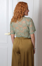 Blusa de encaje con estampado gráfico