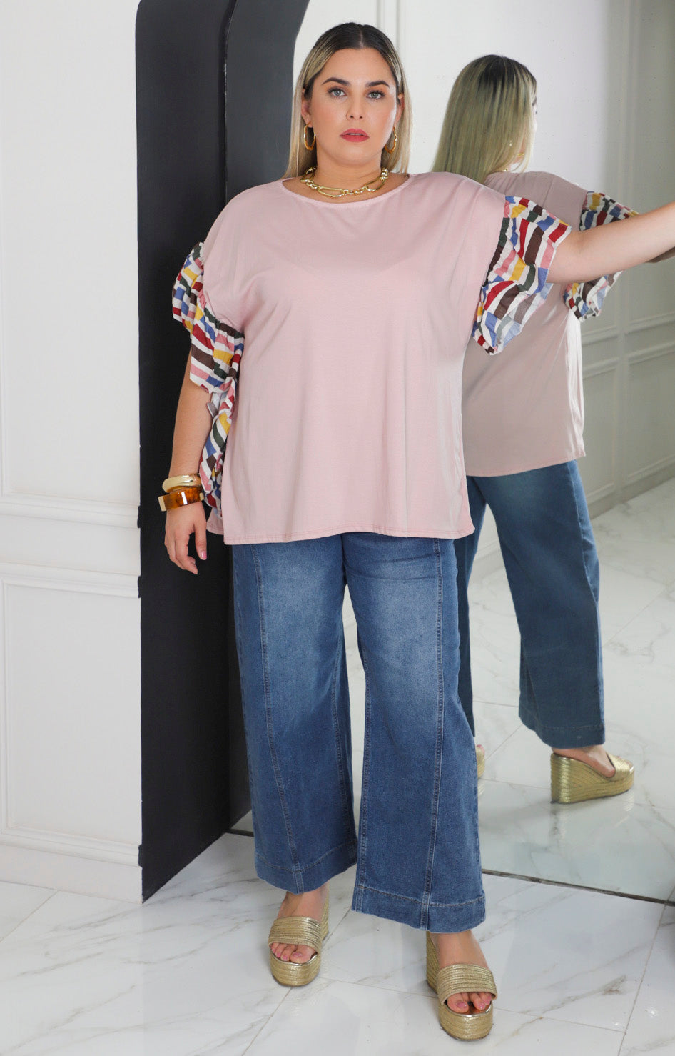 Blusa rosa con manga de olanes