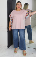 Blusa rosa con manga de olanes