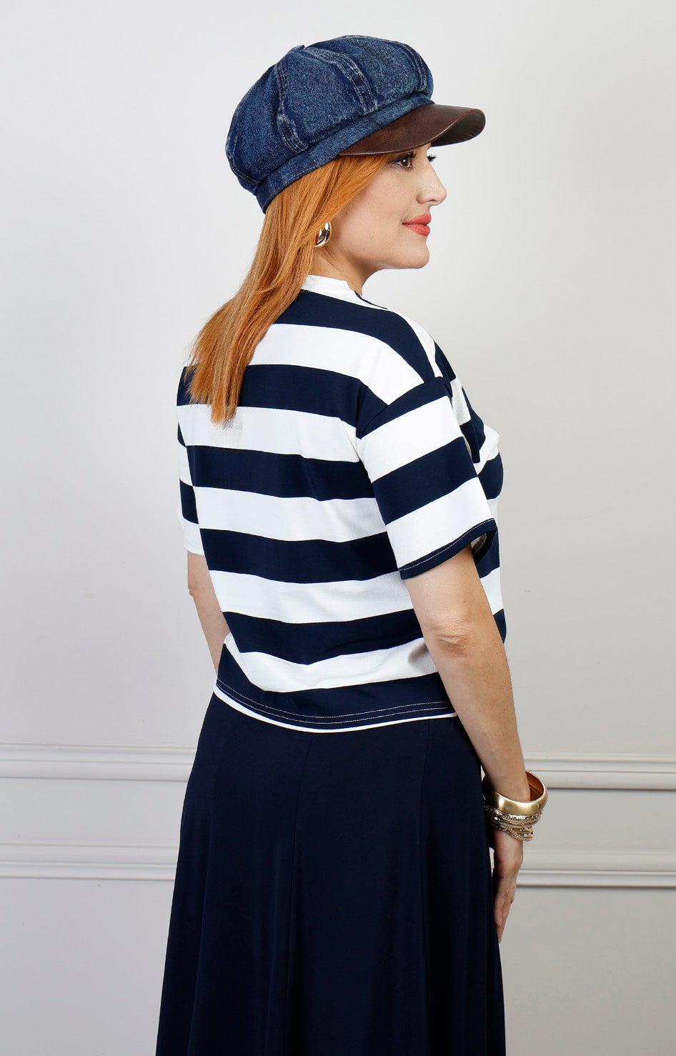 Blusa a rayas con aplicaciones Boutiquemirel, diseño regular y detalles decorativos visibles