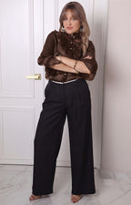 Blusa con olanes y mangas largas