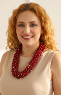 Set de collar rojo multicapa con aretes