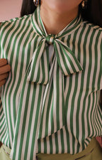 Blusa sin manga a rayas con moño