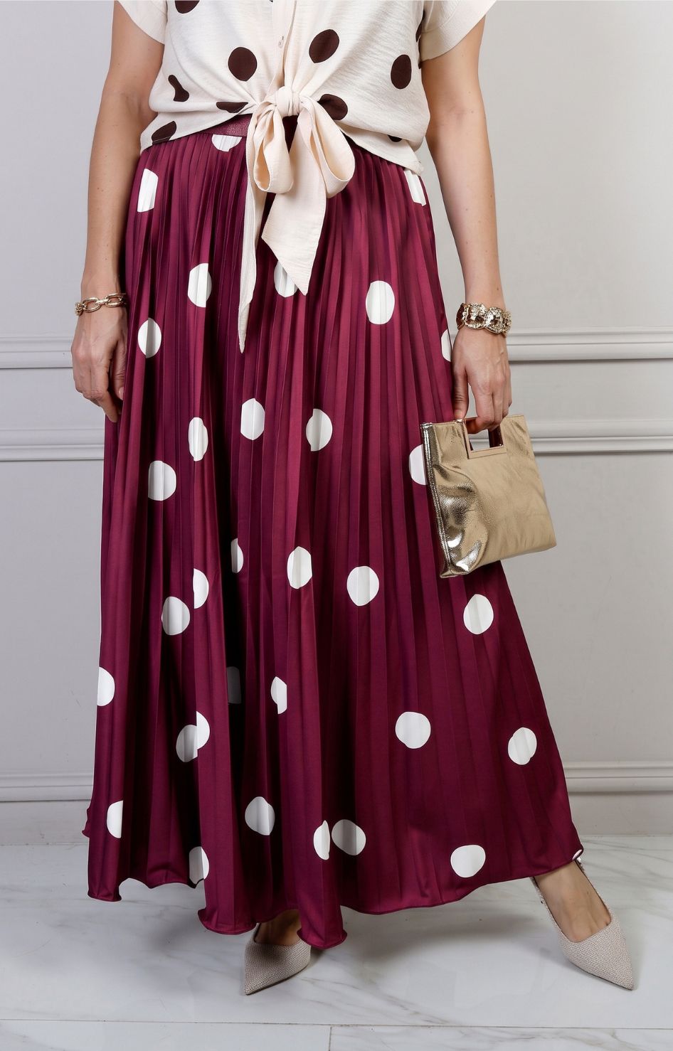 Falda plisada de polka dots
