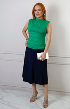 Blusa sin manga con cuello drapeado de la marca Boutiquemirel, estilo regular, en color neutro y tejido suave.