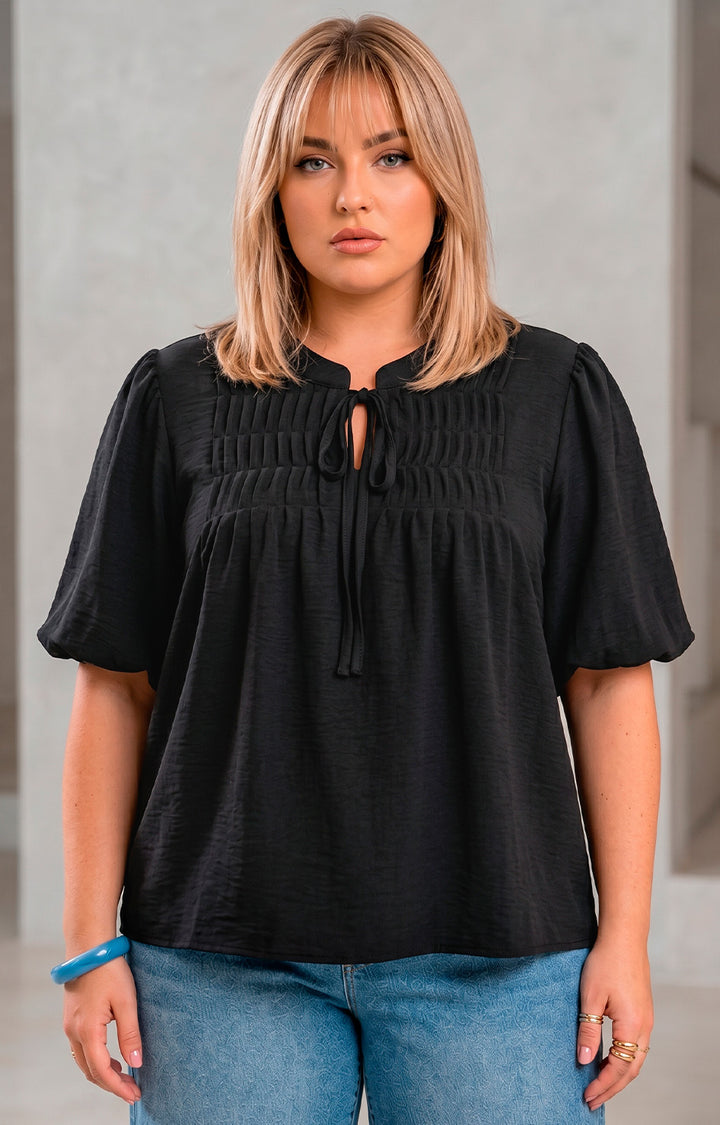 Blusa con tablones y lazo