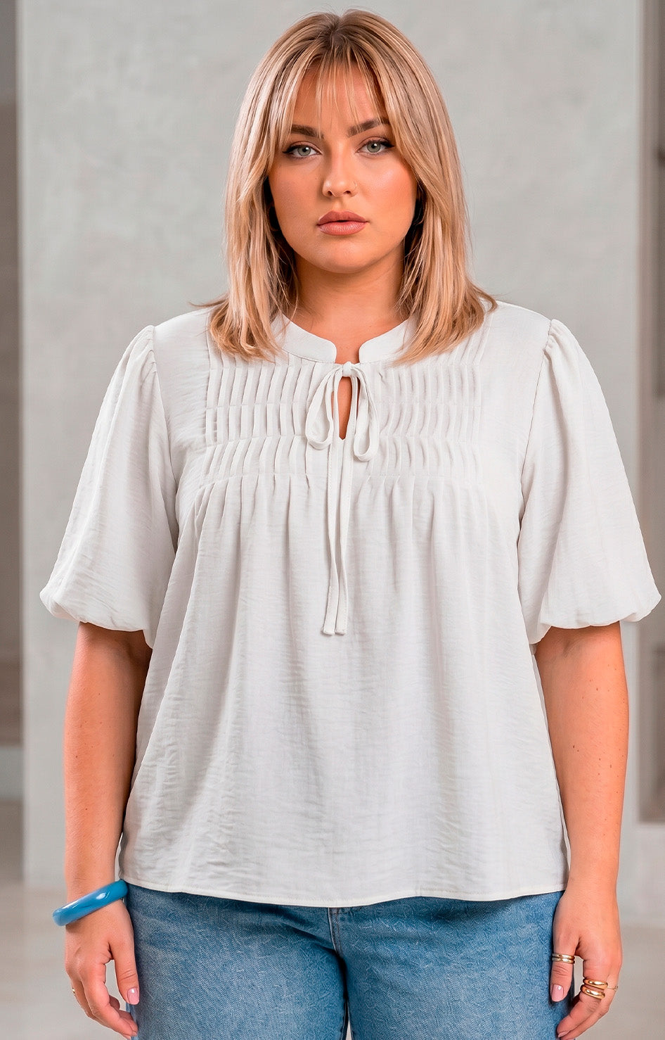 Blusa con tablones y lazo