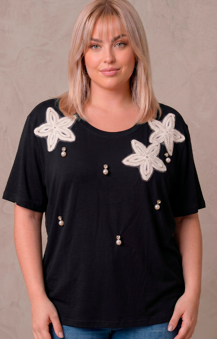 Blusa con bordado de estrella