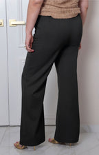 Pantalón curvy Boutiquemirel de tiro alto con cinturón ajustable y diseño elegante