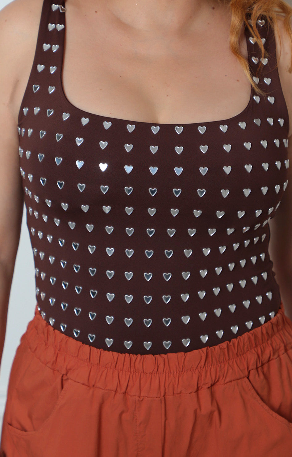 Panty blusa con detalles metálicos