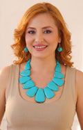 Set de collar y aretes con piedras grandes