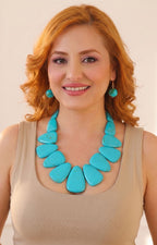Set de collar y aretes con piedras grandes