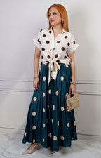 Falda plisada de polka dots