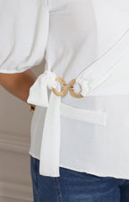 Blusa envolvente con lazo