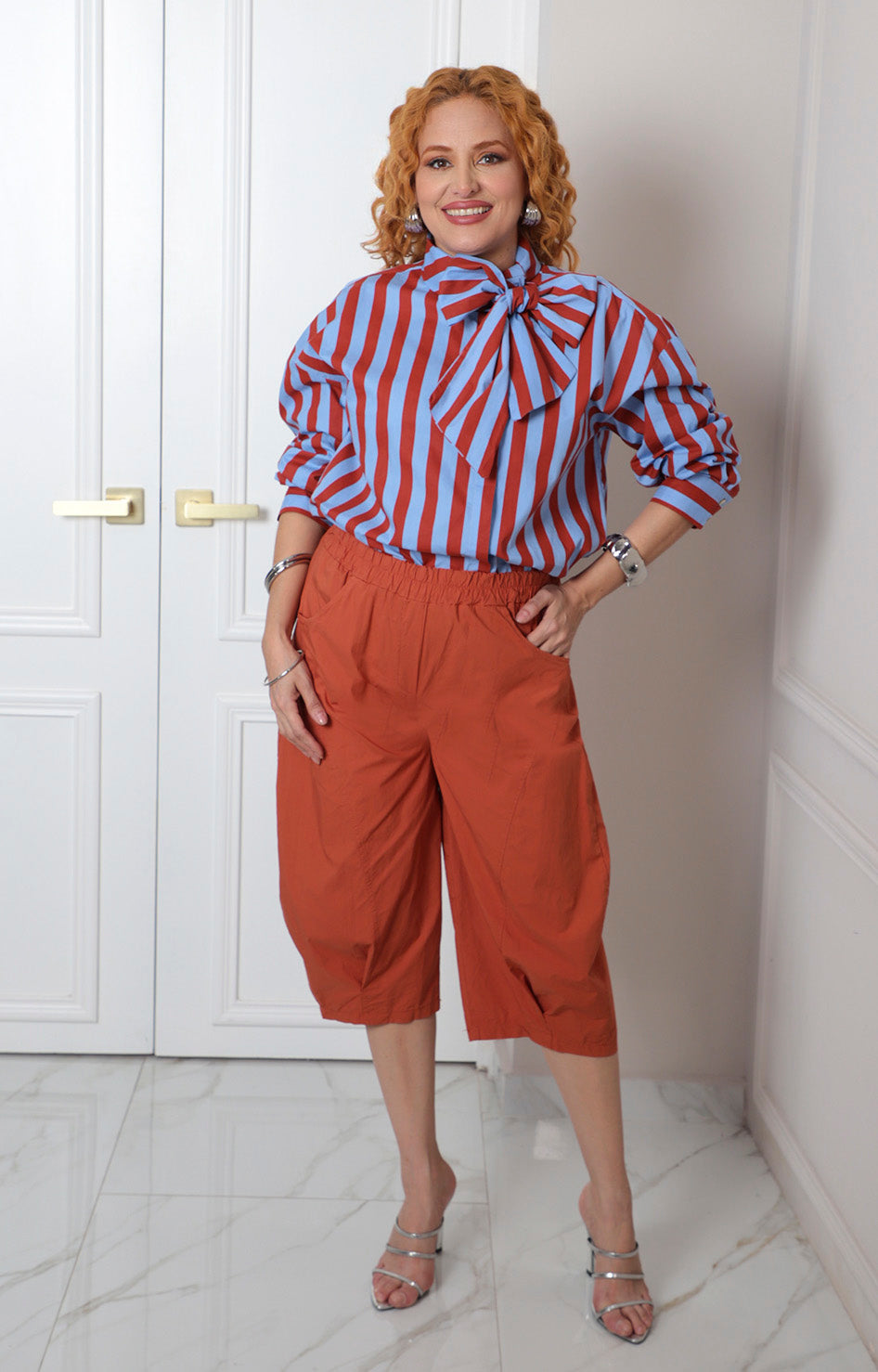 Blusa a rayas con lazo al cuello