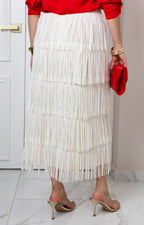 Falda beige de flecos en capas